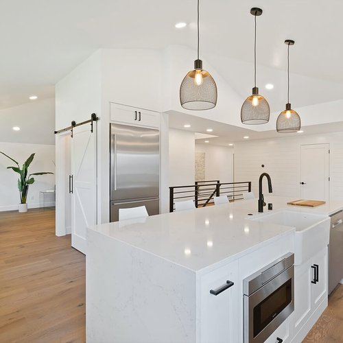 water resistant laminate floors in white kitchen